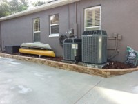20150628 182217  The AC compressors and concrte pads had started leaning so I leveled them before building the retaining wall.