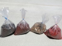 IMG 2554  Here is the mixture of 5lb bags of 'flakes' I plan to install with the epoxy floor. The flake colors are (L-R): C1060 Brown, C9996 Redwood, C9954 Caramel, and C7551 Terra Cotta.